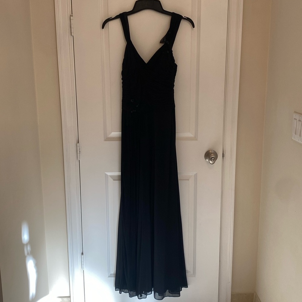 BCBG MaxAzria floor length black evening gown. Size XS.